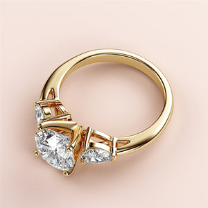 Elegant 14K yellow gold engagement ring with round-cut diamond centerpiece and pear-shaped diamonds, perfect for style and sophistication.