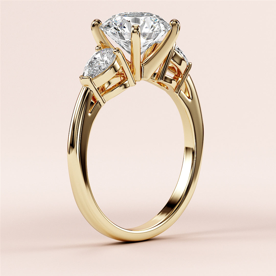 "Elegant 14K yellow gold engagement ring with oval-shaped diamond and two side diamonds, also available in 18K and platinum."