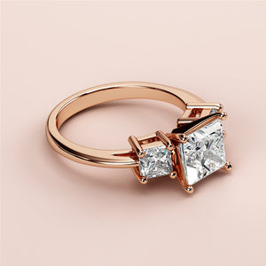 Elegant 14K rose gold princess-cut diamond ring with two square diamonds, perfect for engagement or special occasions.