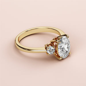 Elegant 14K/18K gold or platinum engagement ring featuring an oval diamond and round accent diamonds, perfect for proposals.