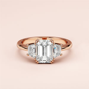 Emerald-cut diamond engagement ring in 14K/18K rose gold or platinum, featuring two stunning trapezoid side stones.