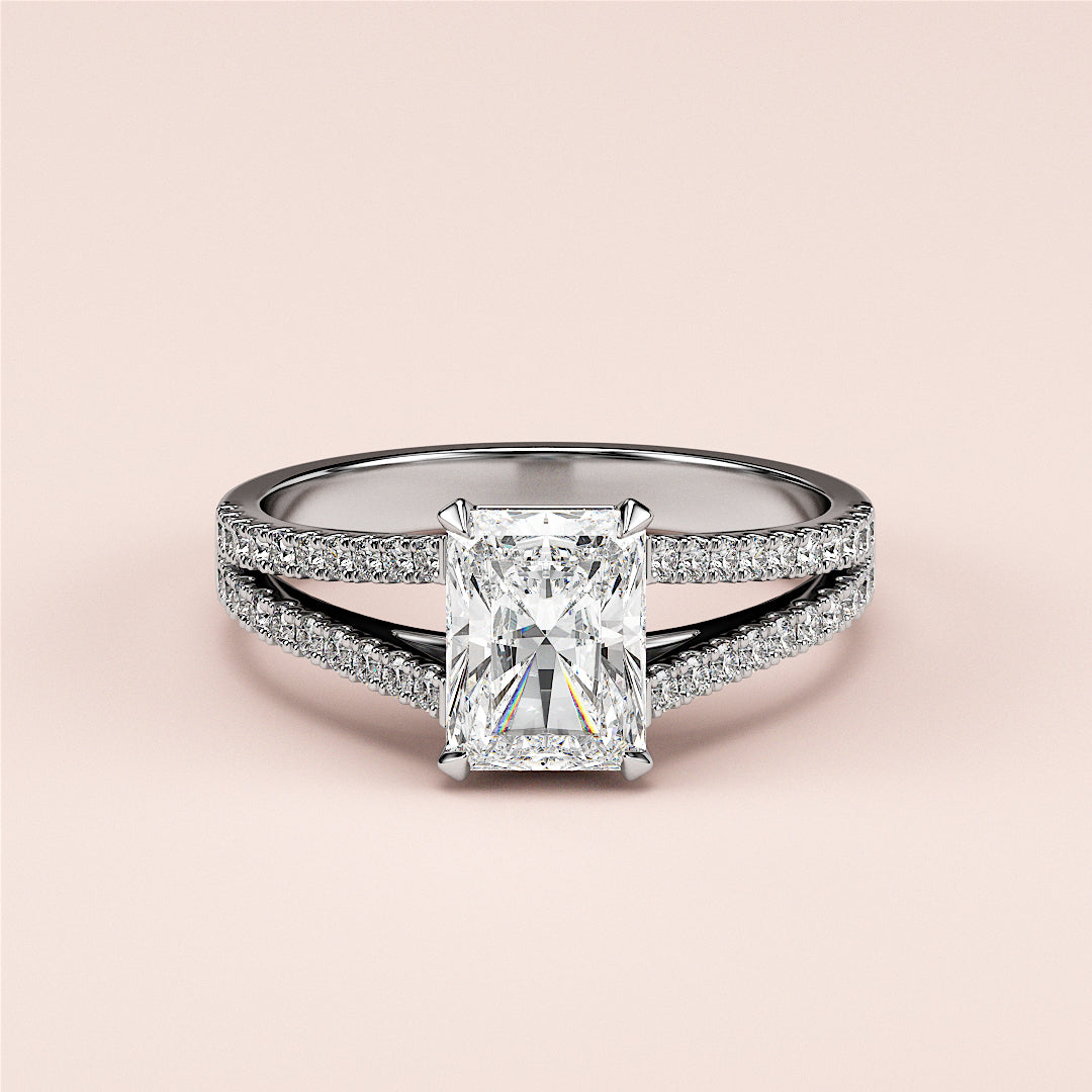 Exquisite radiant-cut diamond engagement ring on a pave band, available in 14K/18K white gold or platinum with split shank design.|

#14KRecycledWhiteGold
#18KRecycledWhiteGold








#Platinum