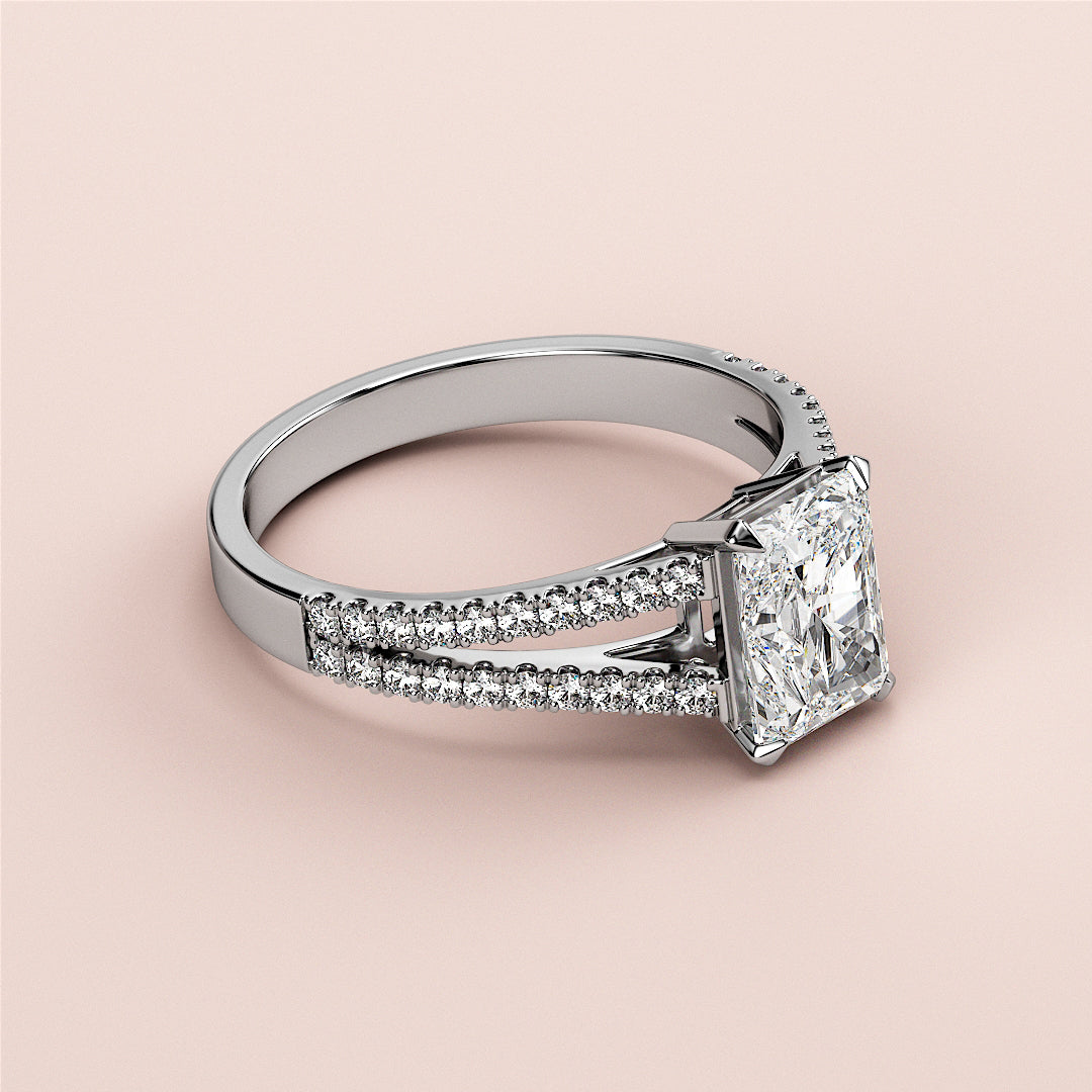 Elegant 14K/18K white gold engagement ring featuring a radiant-cut diamond andPave-set band, not worn on a model.|

#14KRecycledWhiteGold
#18KRecycledWhiteGold








#Platinum