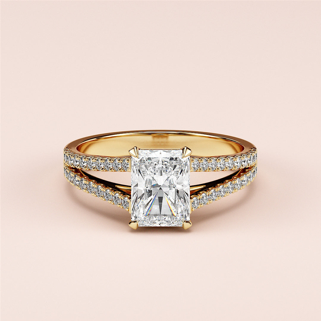 Elegant split shank engagement ring with radiant cut diamond in 14K or 18K gold or platinum, adorned withPave-set diamonds.|




#14KRecycledYellowGold
#18KRecycledYellowGold





