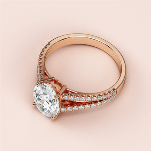Elegant rose gold engagement ring with oval-cut diamond andPave accents, available in 14K, 18K, or platinum.