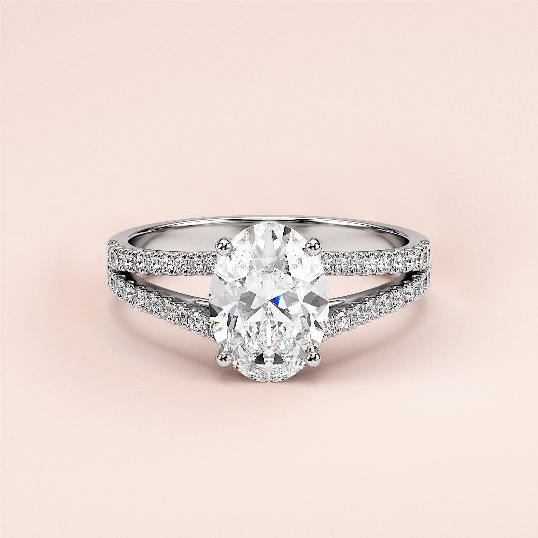 Elegant oval-shaped diamond engagement ring with split shank design in 14K or 18K gold or platinum, exemplifying luxury and craftsmanship.|

#14KRecycledWhiteGold
#18KRecycledWhiteGold








#Platinum