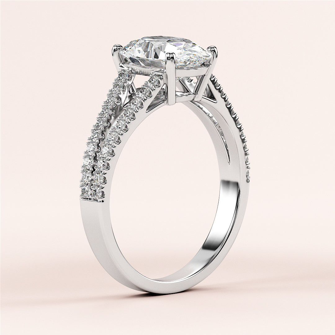 Elegant 14K white gold engagement ring with marquise-cut diamond on pave band, showcasing intricate details and sparkling accents.|

#14KRecycledWhiteGold
#18KRecycledWhiteGold








#Platinum