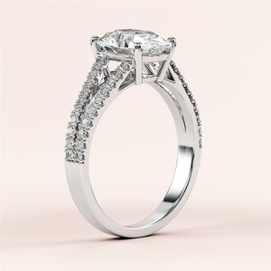 Elegant 14K white gold engagement ring with marquise-cut diamond on pave band, showcasing intricate details and sparkling accents.