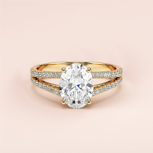 Elegant yellow gold oval-cut diamond engagement ring with split shank andPave accents, available in 14K, 18K, or platinum.