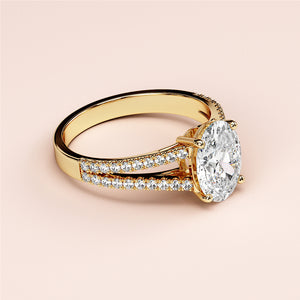Elegant 14K yellow gold engagement ring featuring an oval diamond and a double band of round diamonds for timeless beauty.