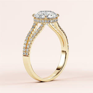 14K yellow gold engagement ring with a large oval diamond center, halo, and pave-set diamonds on the split shank.