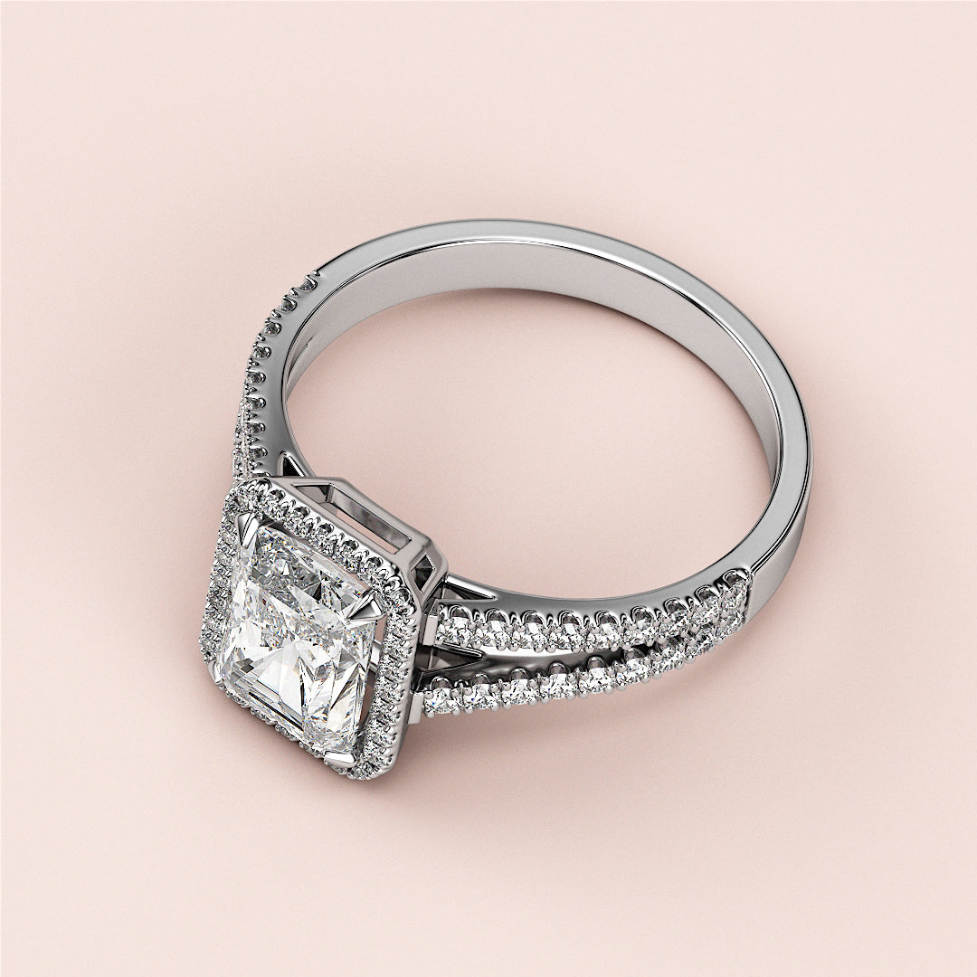 Stunning 14K white gold radiant halo split shank engagement ring with diamond, perfect for timeless elegance.