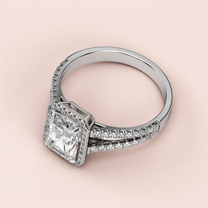 Stunning 14K white gold radiant halo split shank engagement ring with diamond, perfect for timeless elegance.