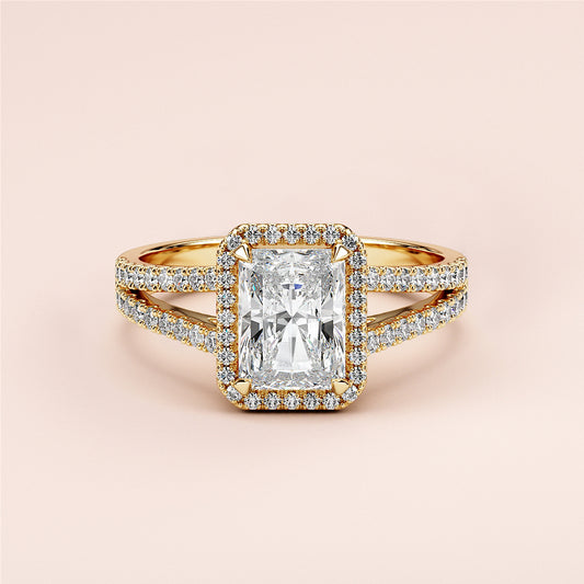 Elegant 14K/18K gold or platinum radiant halo split shank engagement ring with diamond center andPave accents.