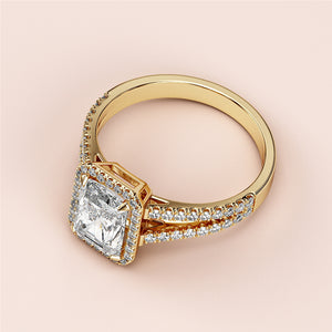 Elegant 14K yellow gold engagement ring featuring a radiant cut diamond andPave diamonds along the cathedral band.