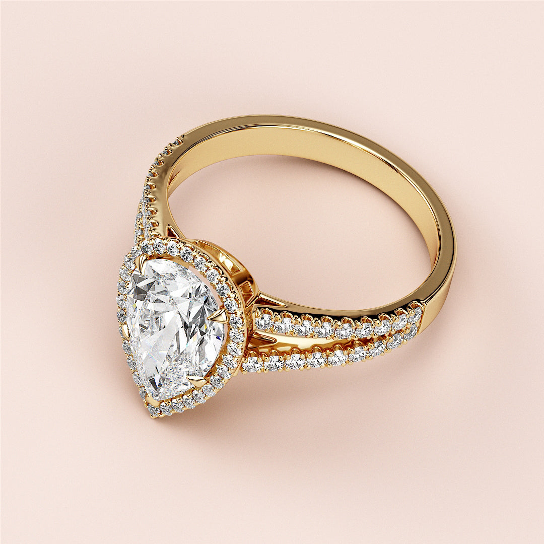14K Gold Pear-Shaped Diamond Engagement Ring with Halo Setting and Pave Band, Elegant Cathedral Design.|




#14KRecycledYellowGold
#18KRecycledYellowGold





