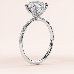 Elegant 14K/18K white gold engagement ring with triangle-shaped diamond andPave diamond band, not worn on model.