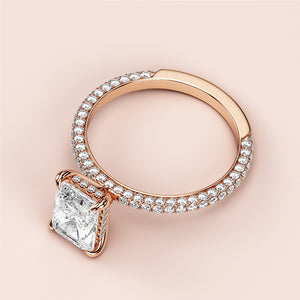 Elegant rose gold diamond engagement ring with a radiant-cut center stone andPave band, available in 14K, 18K, or platinum.