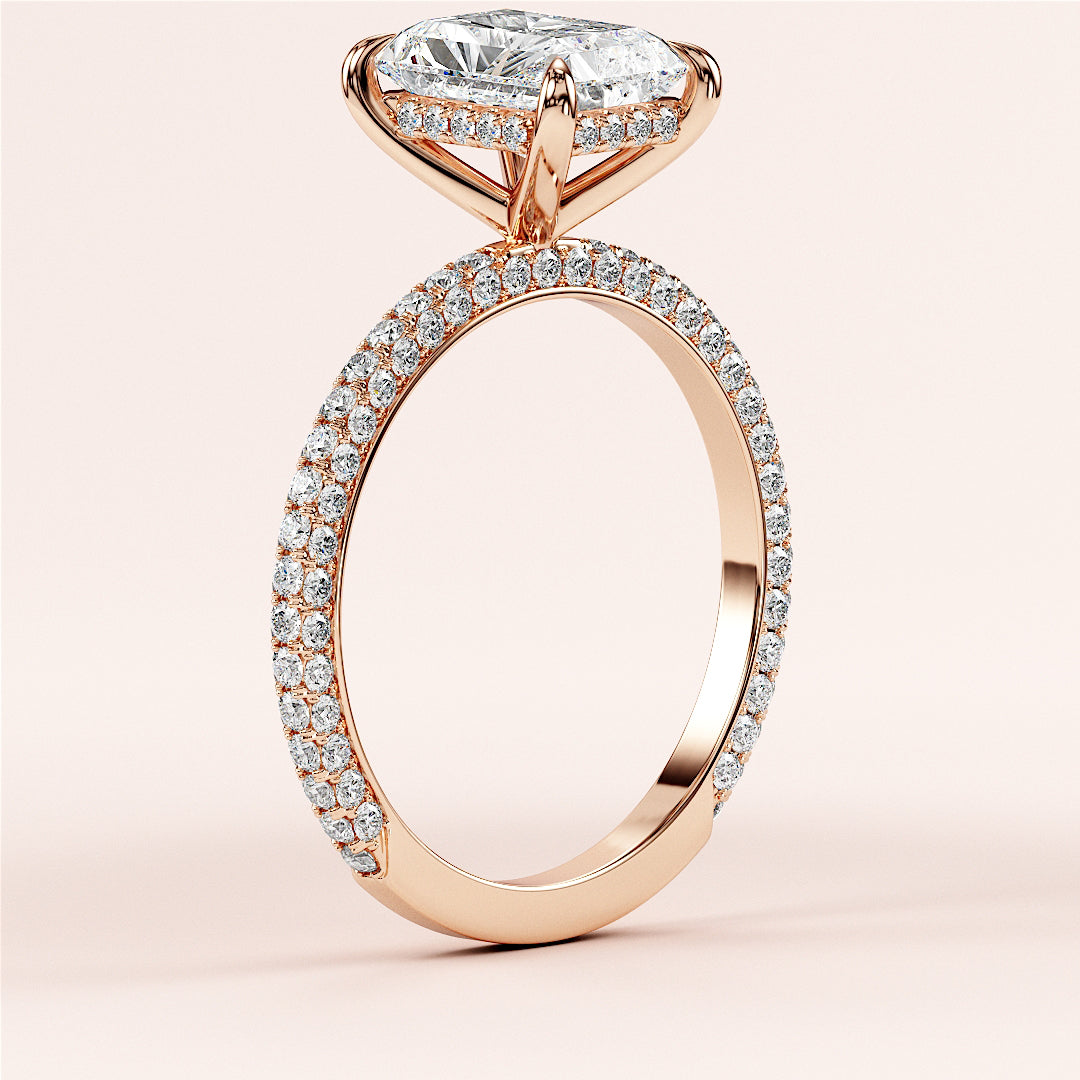 Elegant 14K Rose Gold engagement ring with oval-cut diamond and pave setting, symbolizing timeless love and luxury.|







#14KRecycledRoseGold
#18KRecycledRoseGold



