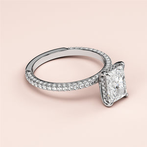 Elegant 14K or 18K white gold engagement ring with a radiant-cut diamond centerpiece andPave diamond band, perfect for proposals.