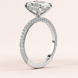 Elegant 14K white gold engagement ring with dazzling oval-cut diamond and pave-set band, side view on a plain background.