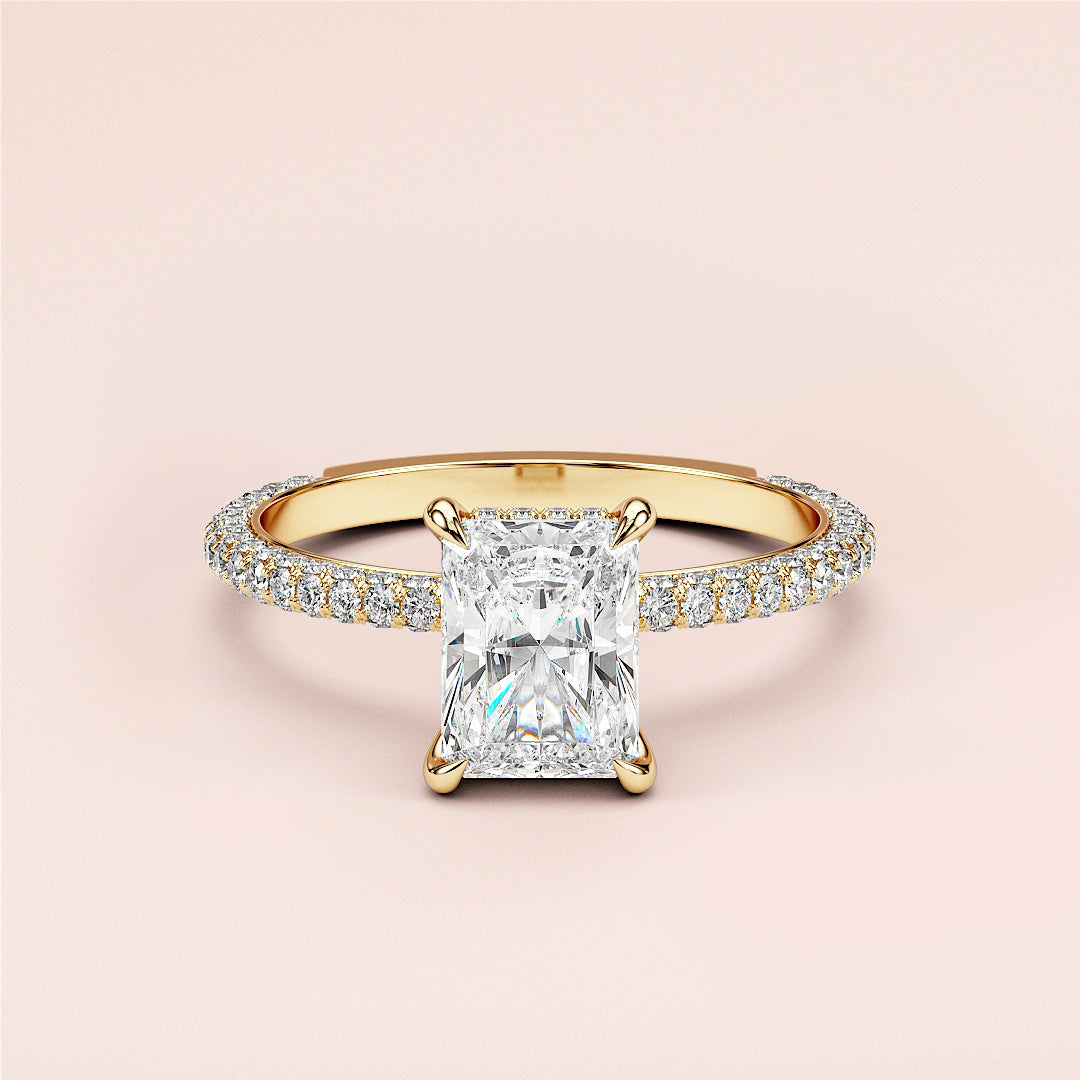 Elegant rectangular diamond engagement ring in 14K gold withPave band, displayed on a pastel background.|




#14KRecycledYellowGold
#18KRecycledYellowGold






