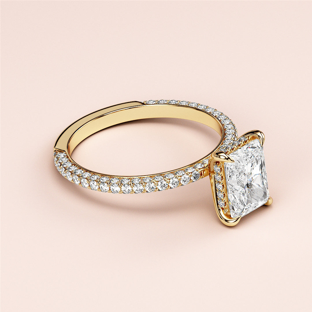 Elegant 14K or 18K yellow gold ring featuring a radiant-cut diamond center and shimmeringPave-set band, perfect for timeless sophistication.|




#14KRecycledYellowGold
#18KRecycledYellowGold





