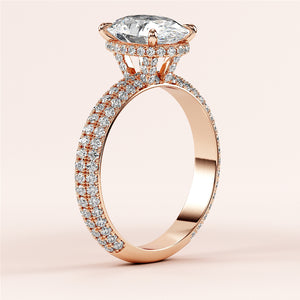Elegant rose gold marquise diamond engagement ring withPave accents and halo setting, available in 14K, 18K, or platinum.