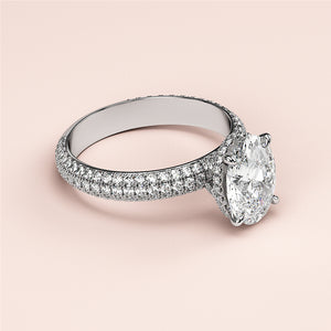 Sophisticated 14K/18K white gold engagement ring with elongated cushion-cut diamond andPave accents. Perfect for exquisite proposals.