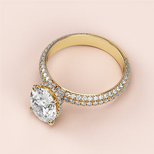 Elegant 14K yellow gold engagement ring featuring an oval hidden halo andPave accents, showcasing a stunning round diamond.