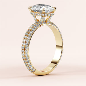 Elegant 14K yellow gold engagement ring with marquise-cut diamond and pave-set accents, perfect for special occasions.