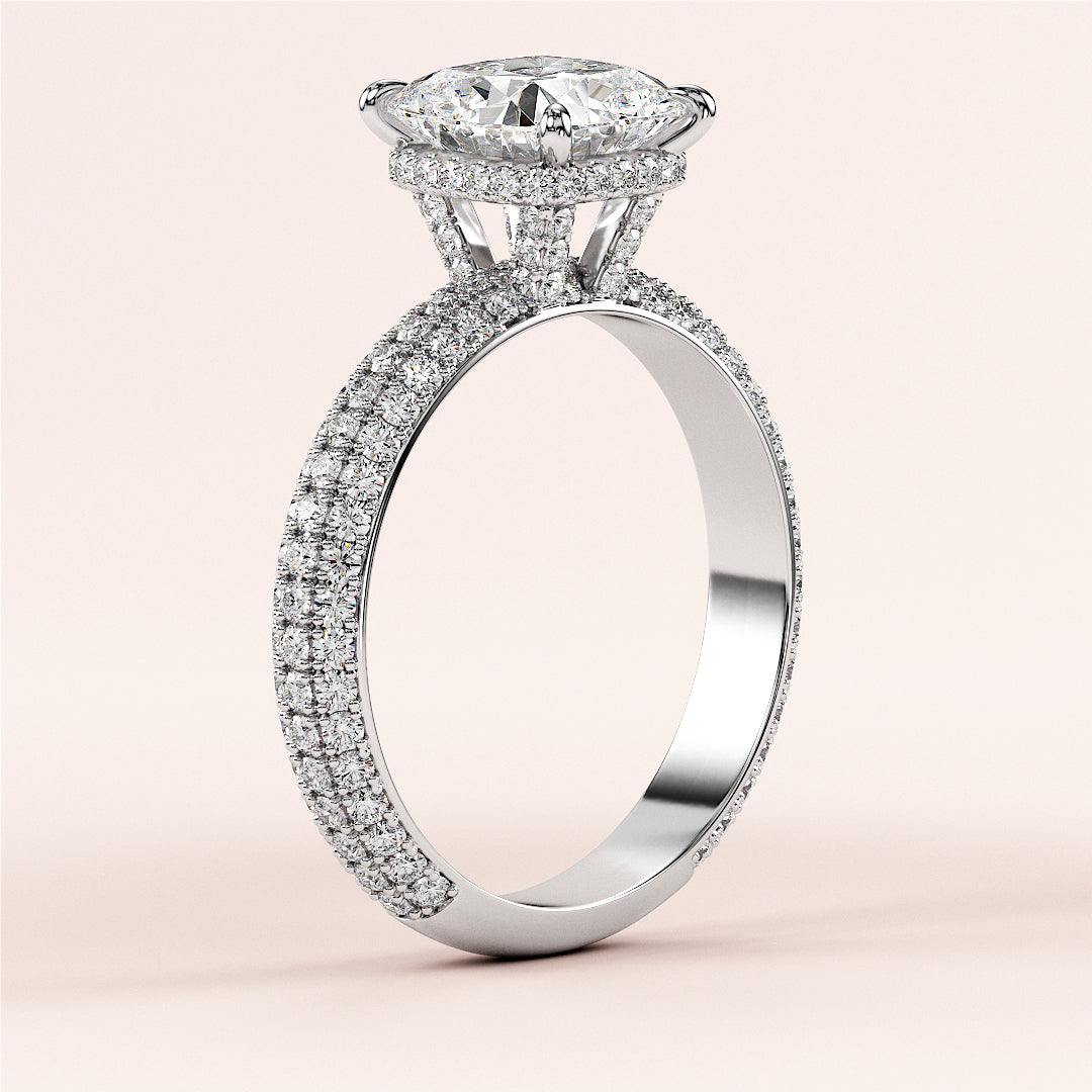 Elegant 14K white gold engagement ring with marquise-cut diamond and pave accents, showcasing a luxurious design.|

#14KRecycledWhiteGold
#18KRecycledWhiteGold








#Platinum