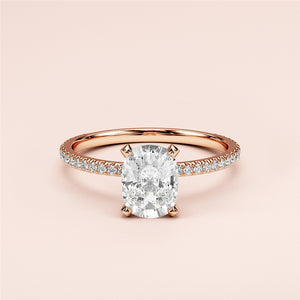 Elegant oval diamond engagement ring in 14K or 18K gold or platinum, featuring a stunning pave-set band and center stone.