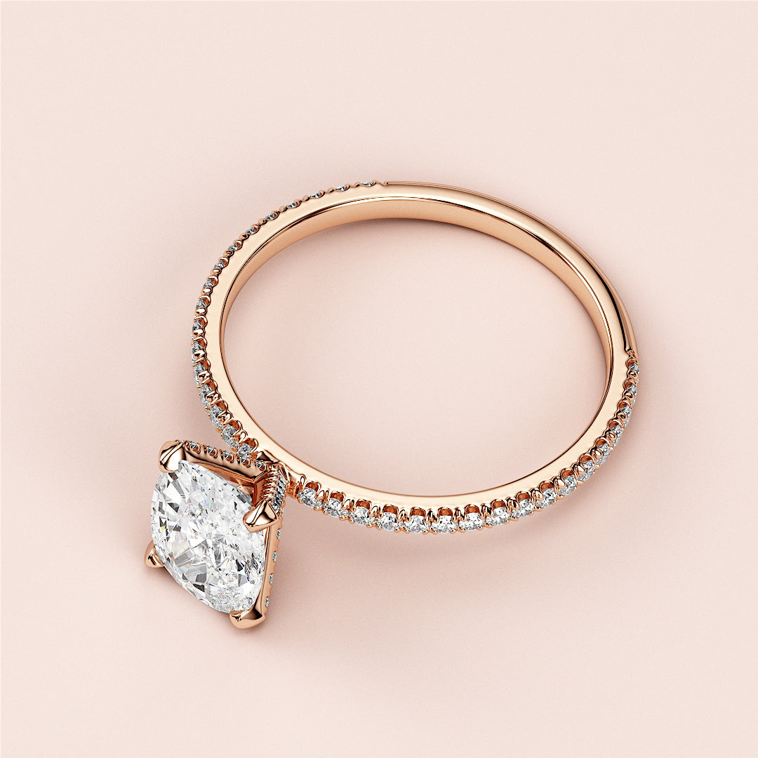 Elegant rose gold engagement ring with oval solitaire and accent diamonds, available in 14K, 18K, or platinum.|







#14KRecycledRoseGold
#18KRecycledRoseGold


