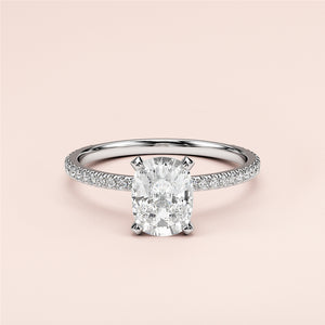 Elegant 14K white gold engagement ring featuring a sparkling oval diamond center and diamond-encrusted band for timeless luxury.