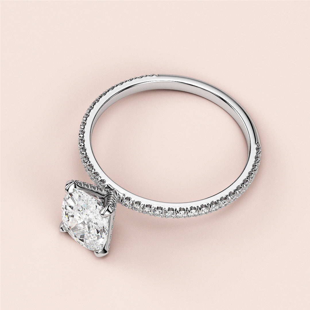 Elegant oval solitaire engagement ring withPave band in 14K/18K white gold or platinum, featuring exceptional sparkle.|

#14KRecycledWhiteGold
#18KRecycledWhiteGold








#Platinum