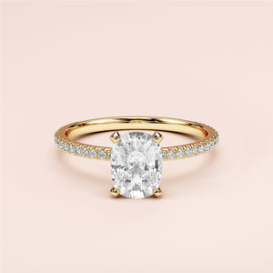 Elegant 14K or 18K gold oval-cut diamond engagement ring withPave band, featuring exquisite accents, not worn on a model.