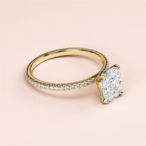 Elegant yellow gold engagement ring featuring a cushion-cut diamond,Pave band, available in 14K or 18K settings.