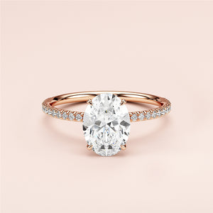 Elegant oval diamond engagement ring in rose gold, featuring aPave band and stunning diamond centerpiece, available in 14K/18K.
