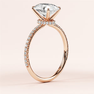 Stunning 14K rose gold engagement ring with marquise diamond in channel setting onPave band, perfect for timeless proposals.