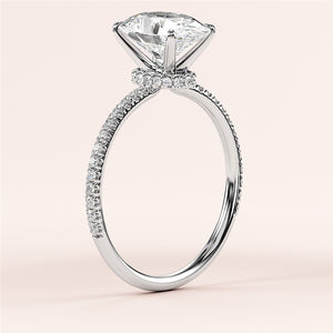 Elegant 14K or 18K gold or platinum engagement ring with an oval diamond center and a sparkling pave-set band.