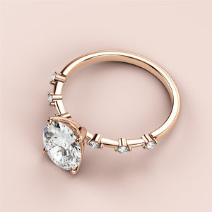 Elegant 14K rose gold engagement ring featuring an oval diamond centerpiece with twinkling accents, against a soft background.