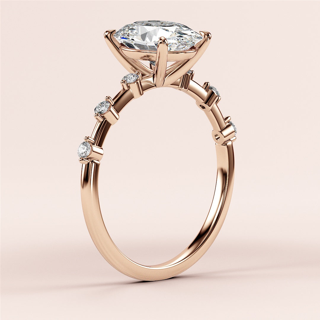 Elegant rose gold marquise-cut diamond engagement ring with side diamonds, available in 14K, 18K, or platinum options.|







#14KRecycledRoseGold
#18KRecycledRoseGold


