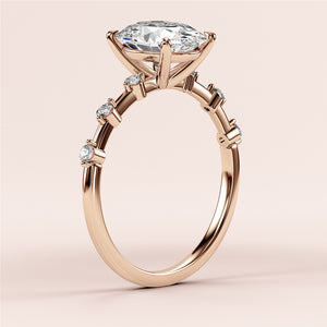 Elegant rose gold marquise-cut diamond engagement ring with side diamonds, available in 14K, 18K, or platinum options.