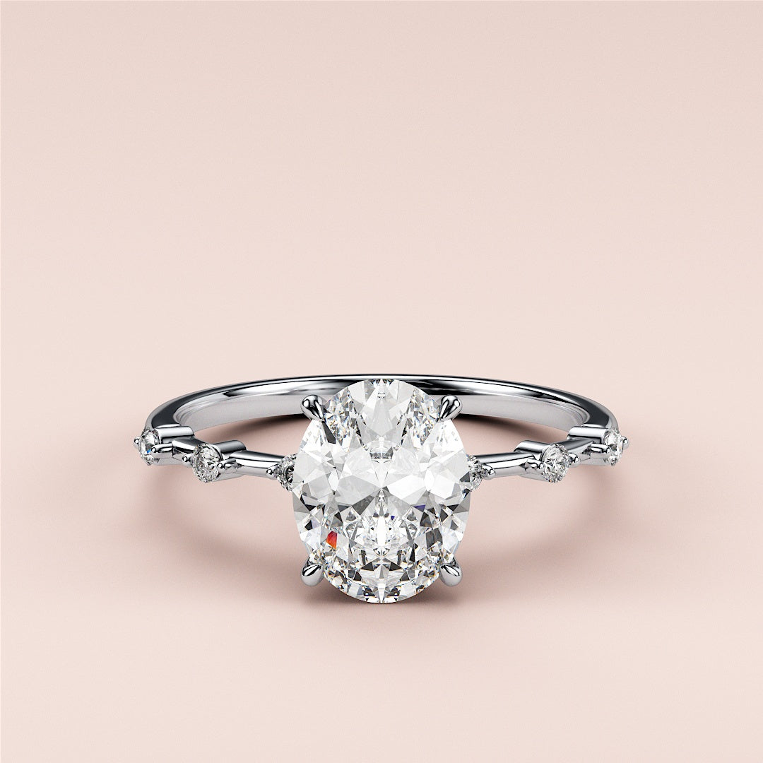 Elegant 14K white gold engagement ring with a dazzling oval diamond center and side diamonds accenting the band.|

#14KRecycledWhiteGold
#18KRecycledWhiteGold








#Platinum