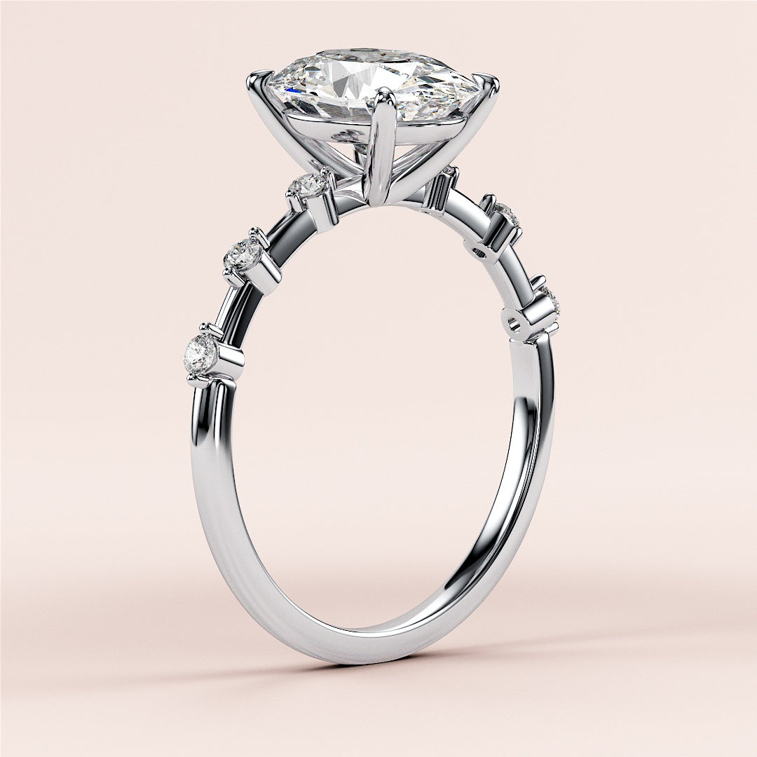 Elegant 14K white gold engagement ring featuring an oval diamond and round diamonds on the band, perfect for timeless romance.|

#14KRecycledWhiteGold
#18KRecycledWhiteGold








#Platinum