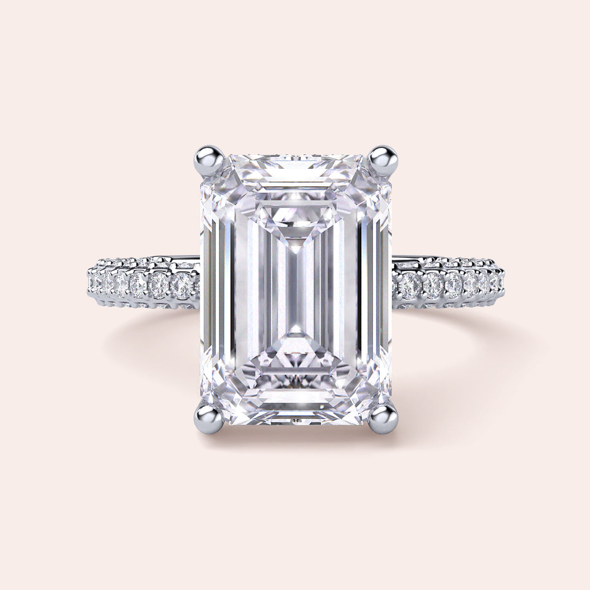Elegant pear-shaped diamond engagement ring in 14K/18K gold or platinum, featuring a sparkling diamond-studded band.
