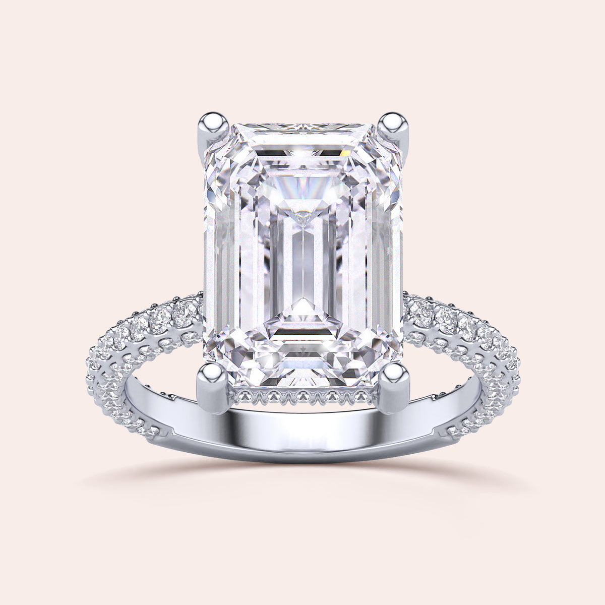 Close-up of a model wearing a 14K/18K/platinum pear-shaped diamond engagement ring withPave accents, showcasing timeless elegance.