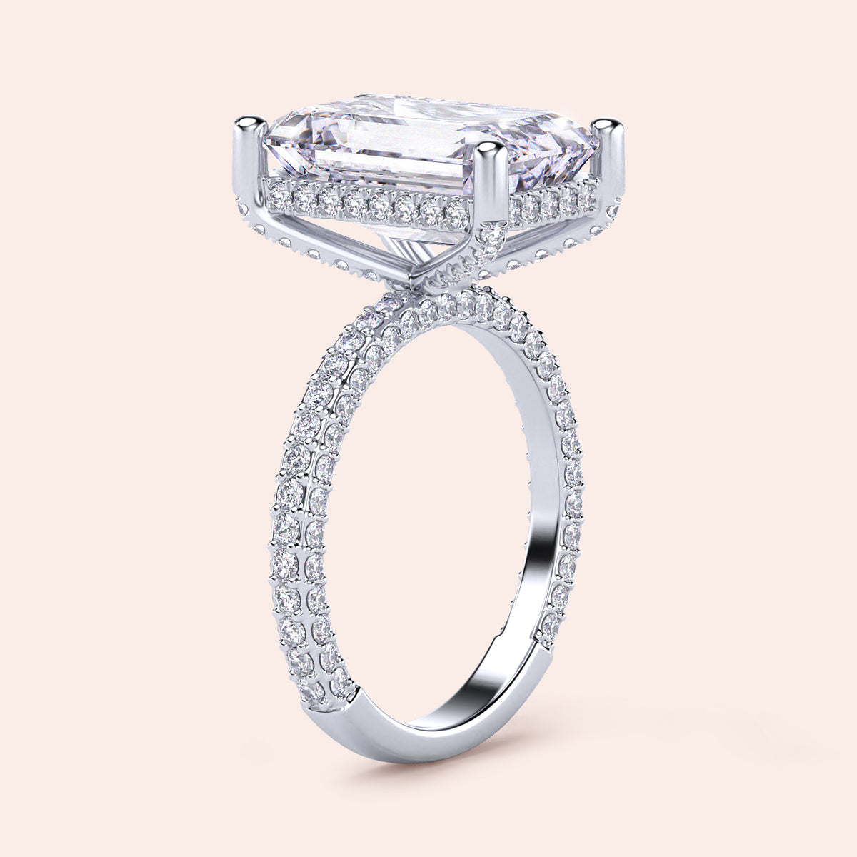 Close-up of a model wearing a 14K/18K/platinum pear-shaped diamond engagement ring withPave accents, showcasing timeless elegance.