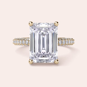Exquisite pear-shaped diamond ring in 14K/18K gold or platinum, adorned with halo diamond accents for an elegant touch.